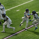 Ryan Tannehill hands off to Derrick Henry on September 27, the last time the Titans took the field.